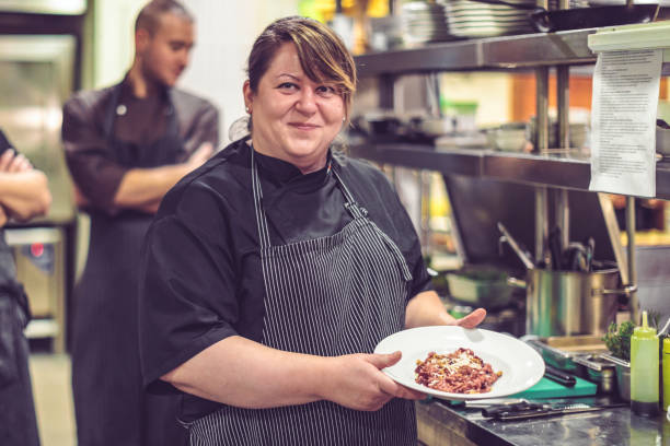 istock Chef is working in an italian restaurant 900920696