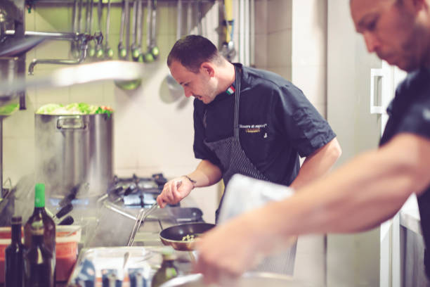 istock Chef is working in an italian restaurant 900920910