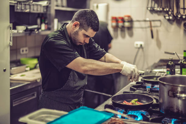 istock Chef is working in an italian restaurant 900921012