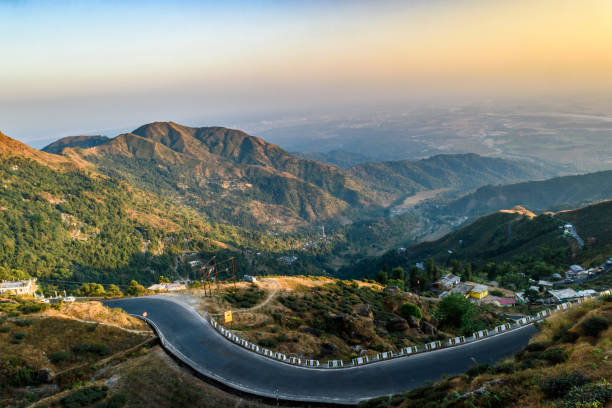 Hilltop view December 31,2016, Darjeeling, West Bengal,India. Hill top view at the time of Sunset with curvy hilly road. darjeeling stock pictures, royalty-free photos & images