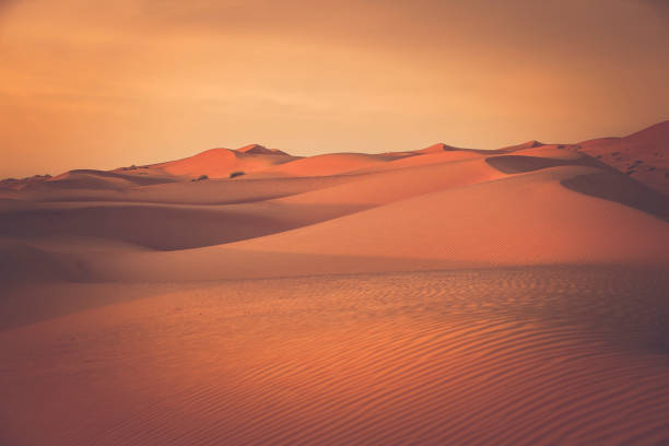 istock desert dunes at wahiba sands in oman 900921782