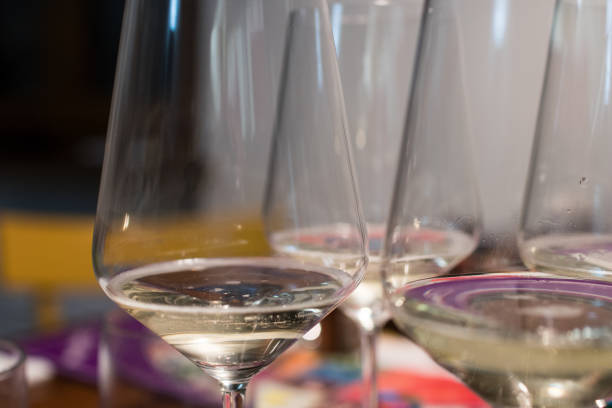 istock Glasses of sparkling wine with small bubbles rising. 900922082