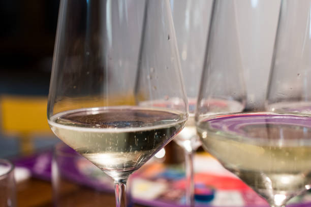 istock Glasses of sparkling wine with small bubbles rising. 900922084