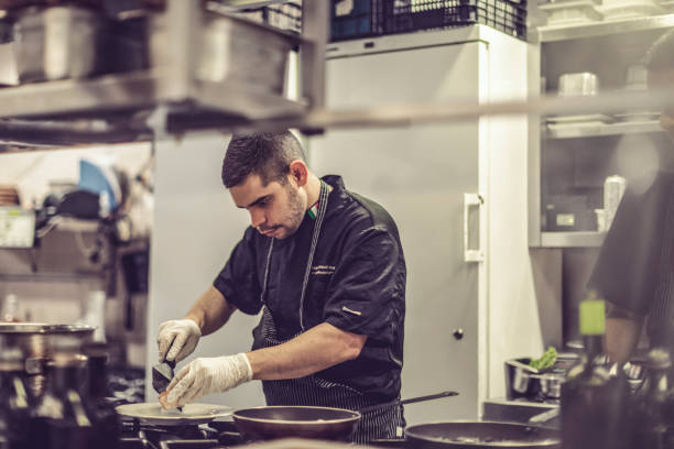 istock Chef is working in an italian restaurant 900922538