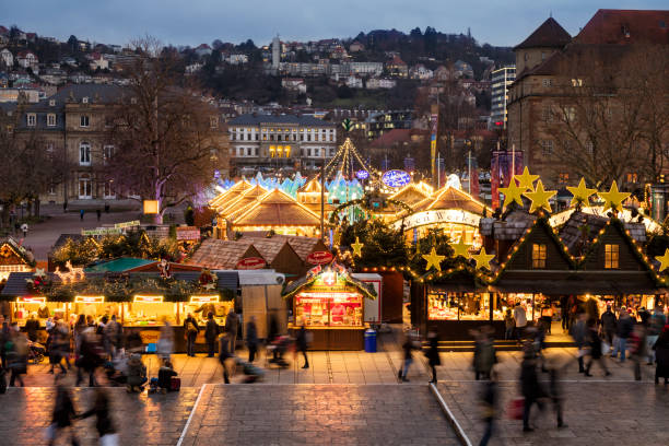 Christmas decorations in Stuttgart at dusk, town square, Swabia, Baden-Wuerttemberg, Germany\n