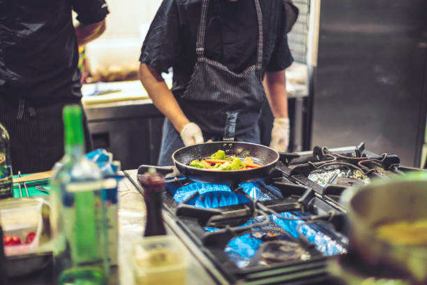 istock Chef is working in an italian restaurant 900925148