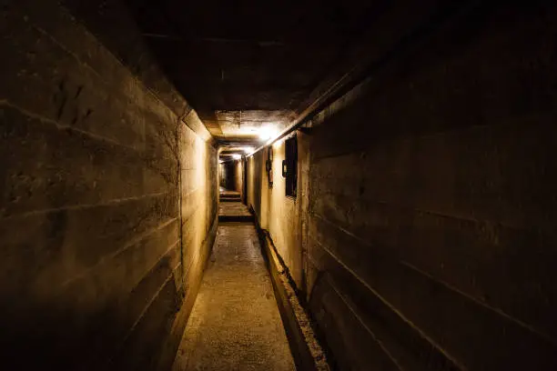 Dark corridor of old underground Soviet military bunker under artillery fortification., Sevastopol, Crimea.