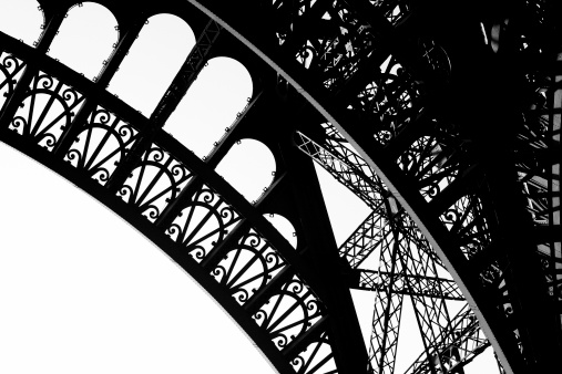 Architectural detail of the famous French tower: The Eiffel Tower in Paris.