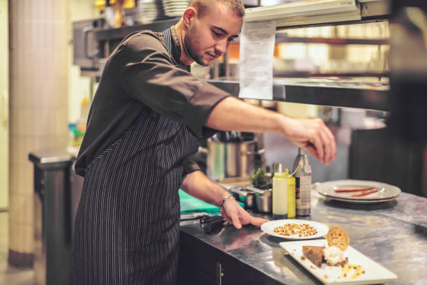 istock Chef is working in an italian restaurant 900925706