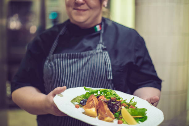 istock Chef is working in an italian restaurant 900925888
