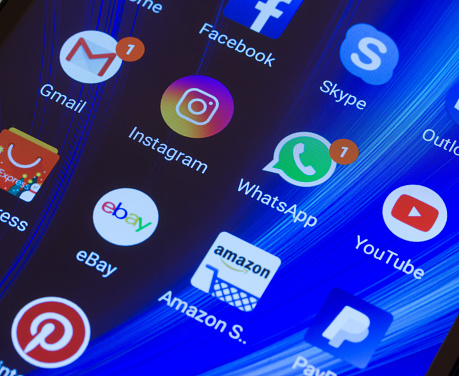 Adygea, Russia - January 2, 2018: WhatsApp, YouTube, instagram, Facebook, Skype and other app icons on the smartphone screen Xiaomi