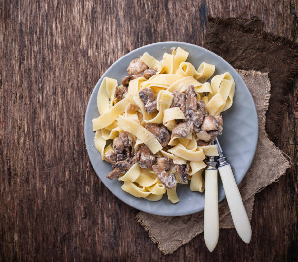 istock Pasta tagliatelle  with  mushrooms 900926408