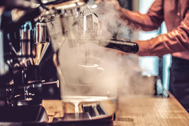 istock Barista is working in a coffee shop 900929618