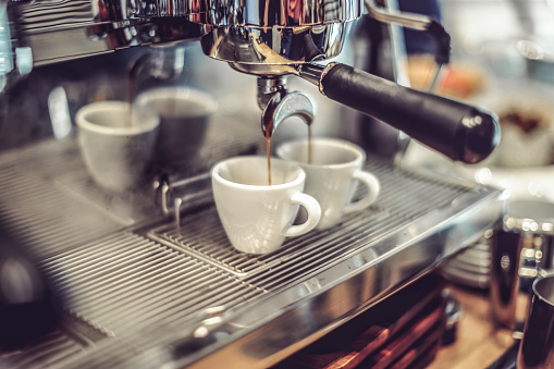 Barista is working in a coffee shop