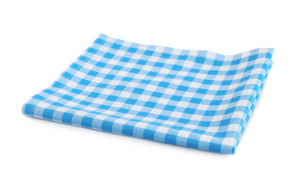 голубая клетчатая ткань изолирована на белом. - checked blue tablecloth plaid стоковые фото и изображения