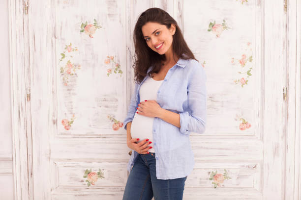 istock Young woman expecting a baby. Pregnancy. 900945080