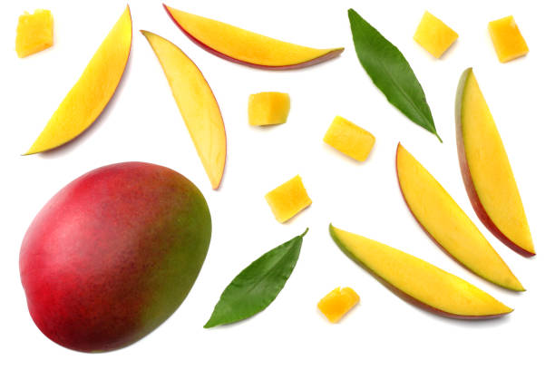 istock mango slice with green leaves isolated on white background. top view 900955254