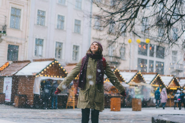 istock Woman walking on Christmas market 900962018