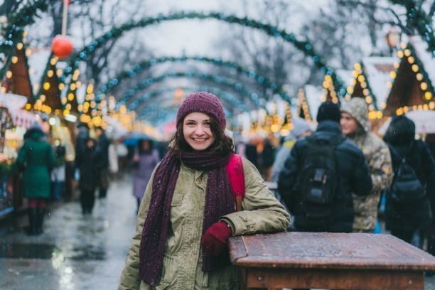 istock Woman walking on Christmas market 900962068