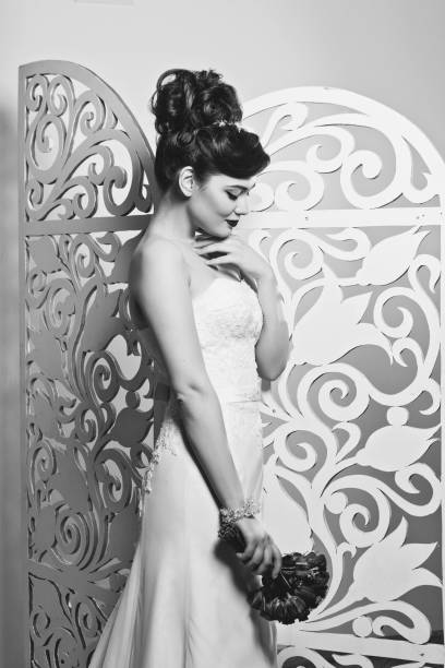 istock beautiful girl in wedding gown 900965710