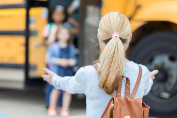 istock Anxious mom waits for her daughter after school 900966096