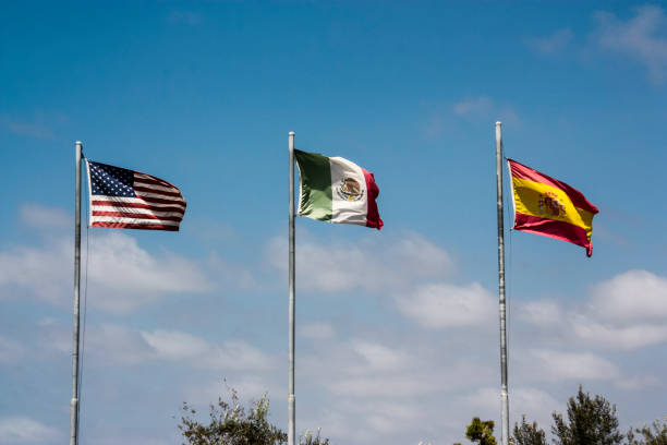 istock American Mexican and Spanish Flags 900972220