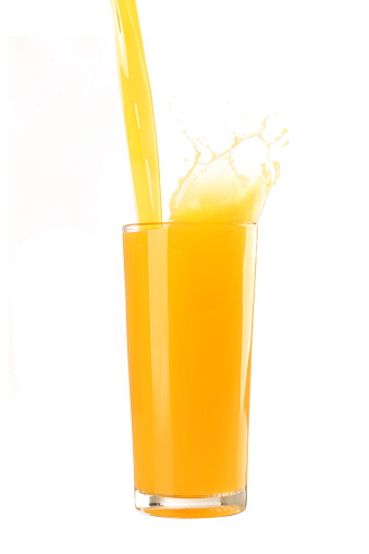 splash de taza de jugo de naranja photo