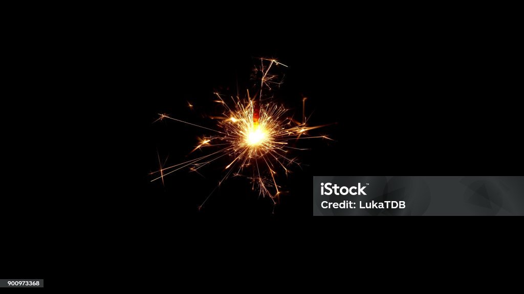 Burning sparkle in pitch black surrounding Burning sparkle in pitch black surrounding. Sparks Stock Photo