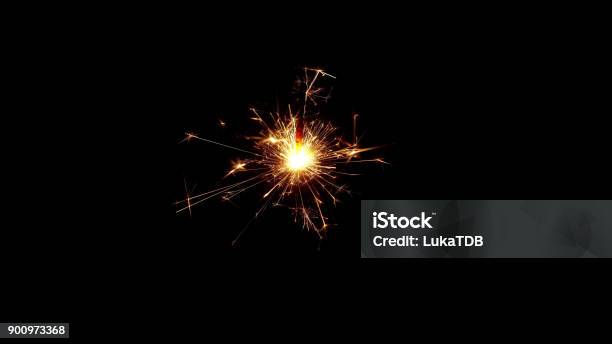 Burning Sparkle In Pitch Black Surrounding Stock Photo - Download Image Now - Sparks, Abstract, Black Background