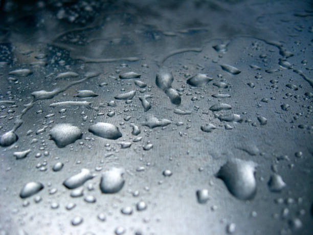 istock Droplets of water on glass 900976806