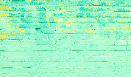 Abstract Brick Wall Background. Old Green painted Brickwall Texture. Grunge Wallpaper or Web banner With Copy Space For design
