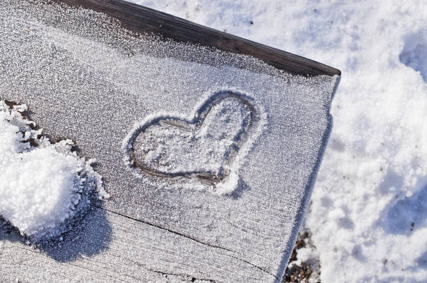 istock Heart on the snow 900983182