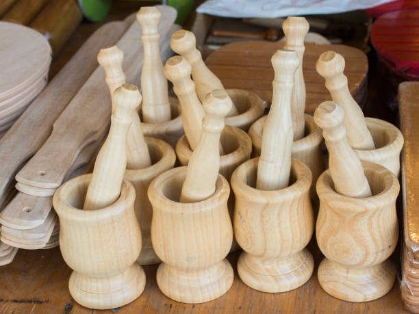 istock wooden mortars and pestles as a kitchenware 900984288