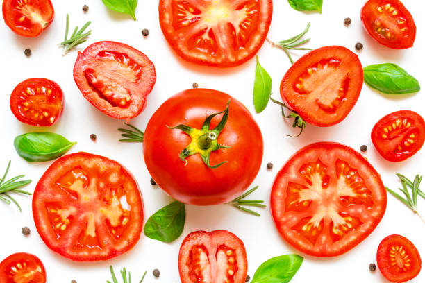 istock fresh tomatoes, herbs and spices on white background 900990998