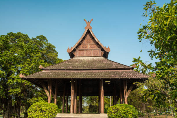 istock wood pavilion Thailand in the park . 900995248