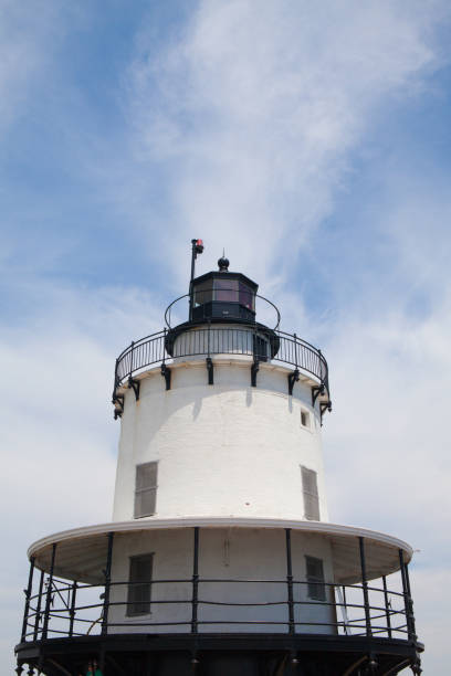 Portland Breakwater Lighthouse Portland Breakwater Lighthouse (Bug Light) is a small lighthouse at the south Portland Bay, Portland, Maine, USA.It was built in 1875 and is one of Maine's most elegant lighthouses. lighthouse lighting equipment reflection rock stock pictures, royalty-free photos & images