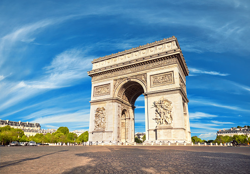 Arc de Triumph in Paris, France, on a bright sunny day in Spring