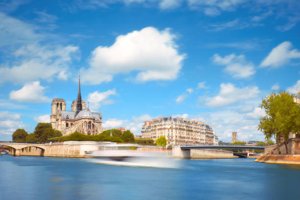istock Paris in Spring. Touristic boat on the river next to Ile de la Cite 901022612