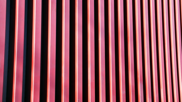 istock Texture of red corrugated fence. 901042520
