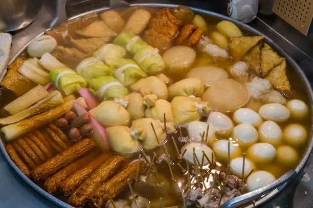 Hot oden with daikon radish, boiled eggs, sausages, cabbage wraps, and more