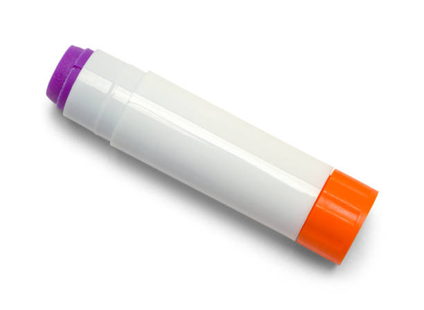Glue Stick Open Purple Glue Stick Isolated on White Background. solvent stock pictures, royalty-free photos & images