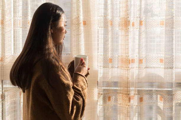 istock woman spending her leisure time in home 901071856