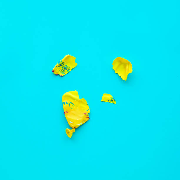 istock Break balloon on blue background party celebration concept 901077858