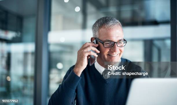 What Career Dedication Looks Like Stock Photo - Download Image Now - Senior Adult, Businessman, Using Phone