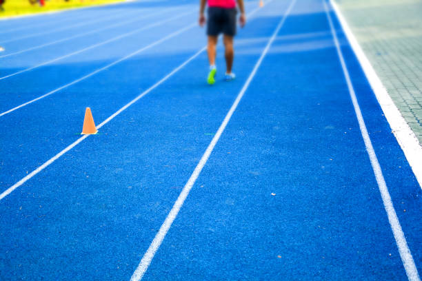istock Treadmill,Athletics Stadium space sport track line running 901078042