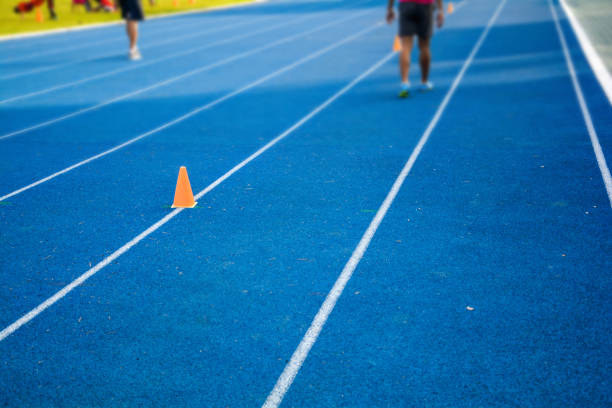 istock Treadmill,Athletics Stadium space sport track line running 901078514