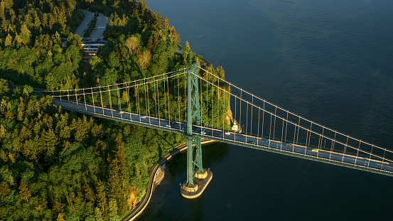 View of Lions Gate Bridge with sea and forest, Vancouver, British Columbia, Canada.
