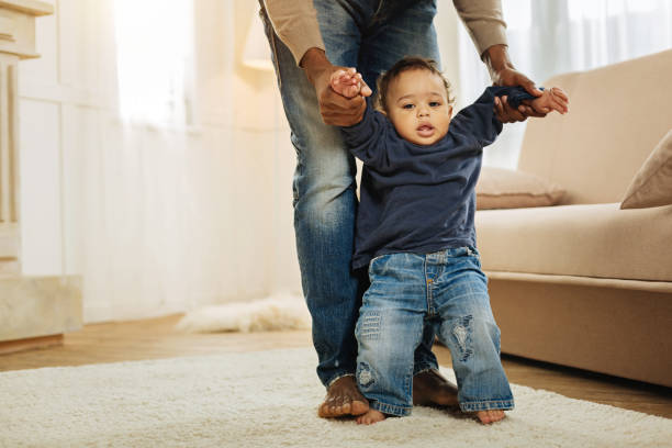 istock Sweet child learning to walk 901083218