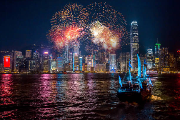 istock Double Exposure of firework and city 901085898