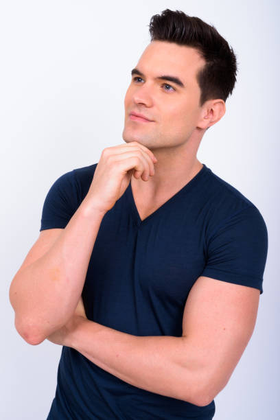 istock Portrait Of Handsome Young Man Against White Background 901085928
